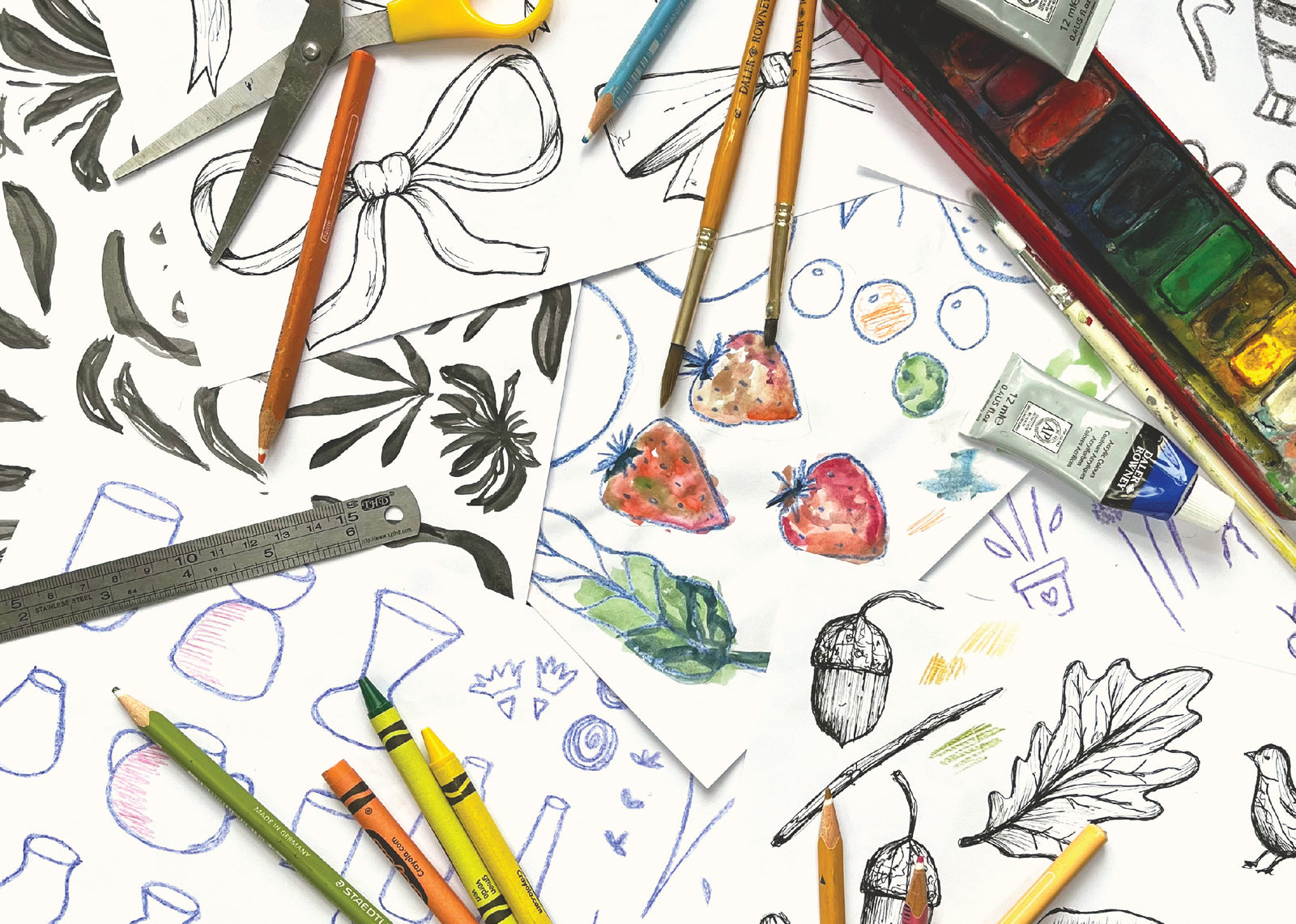 Sketches and paints on a desk